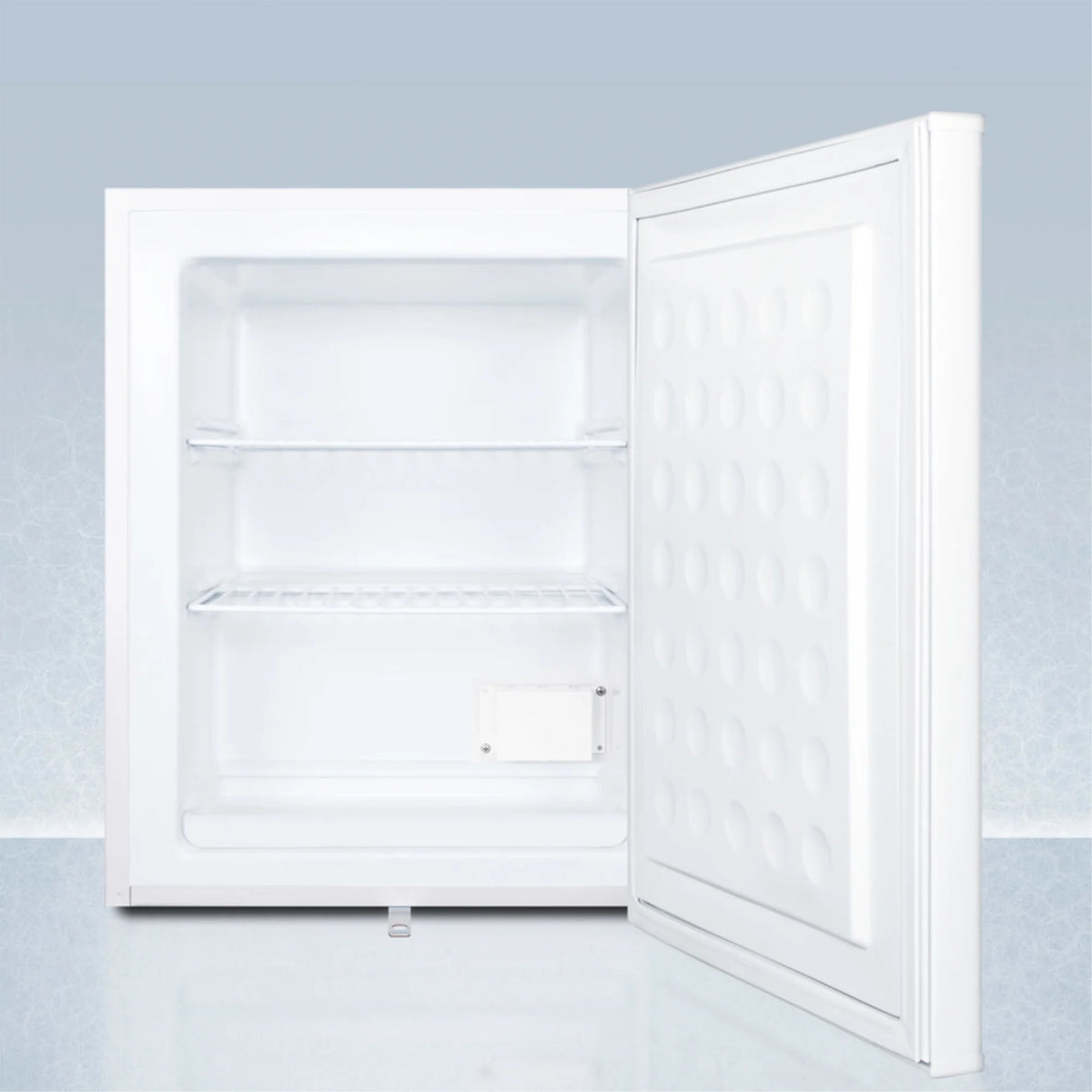 Compact manual defrost all-freezer with lock and probe hole