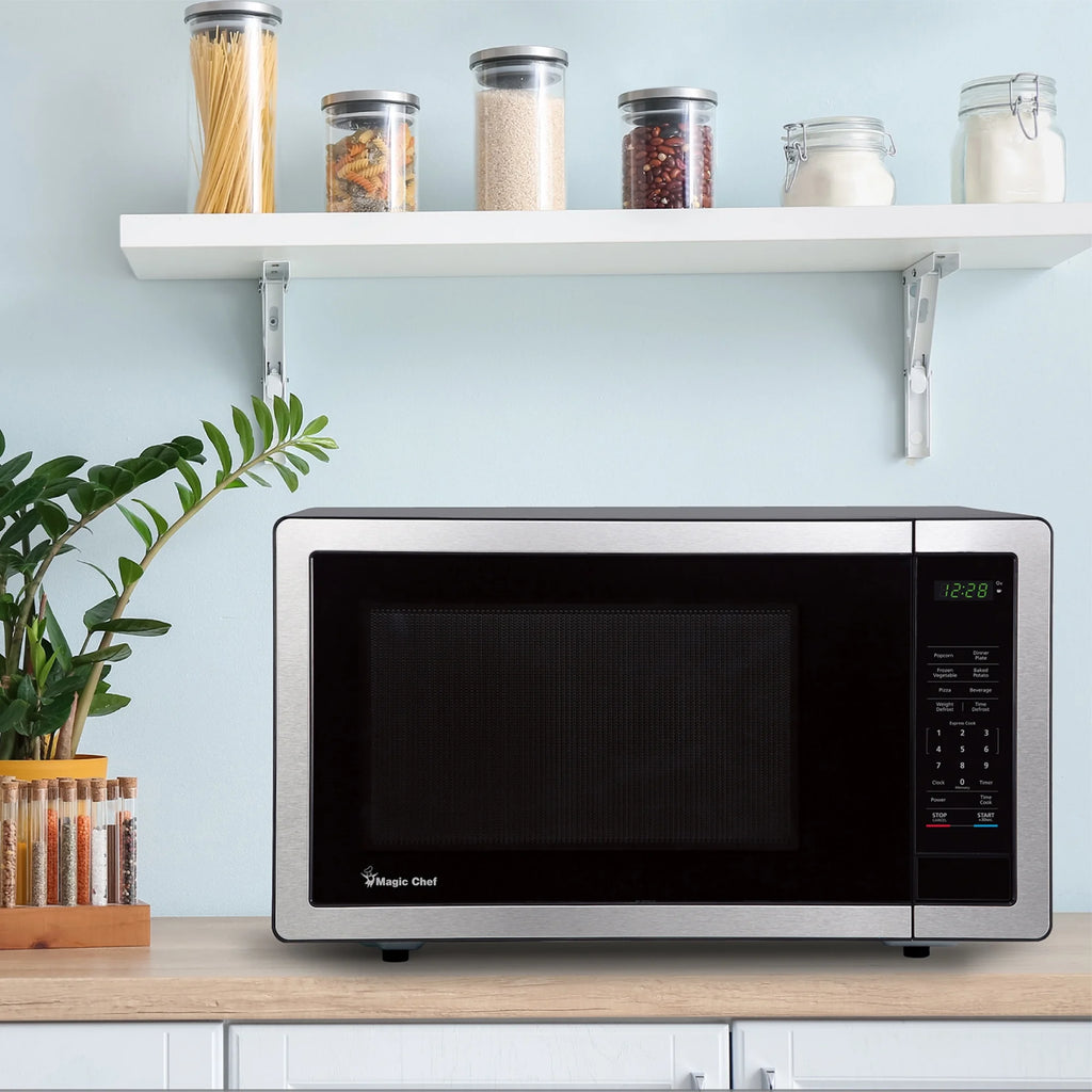 Magic Chef 1.6 Cu. ft. 1100W Countertop Microwave Oven with Push-Button Door in Black, New