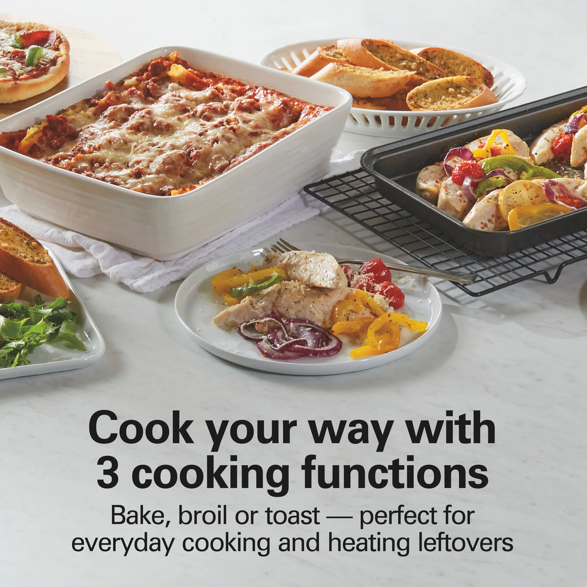 Hamilton Beach 4 Slice Countertop Toaster Oven with Easy Reach Roll-Top Door, Bake, Broil & Toast Functions, Silver
