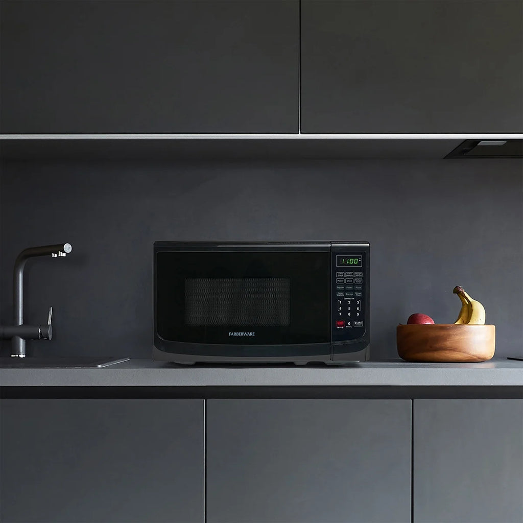 Farberware Countertop Microwave Oven with LED Lighting & Child Lock, 0.7 Cu Ft Black
