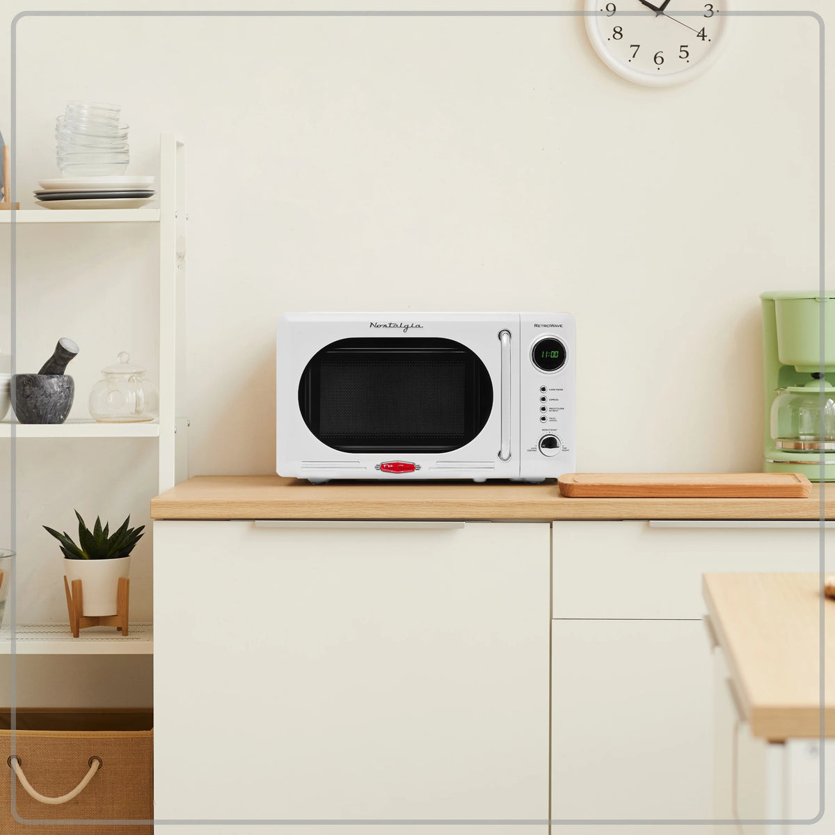 Nostalgia Retro Compact Countertop Microwave Oven - 0.7 Cu. Ft. - 700-Watts with LED Digital Display - Child Lock - Easy Clean Interior - Orange