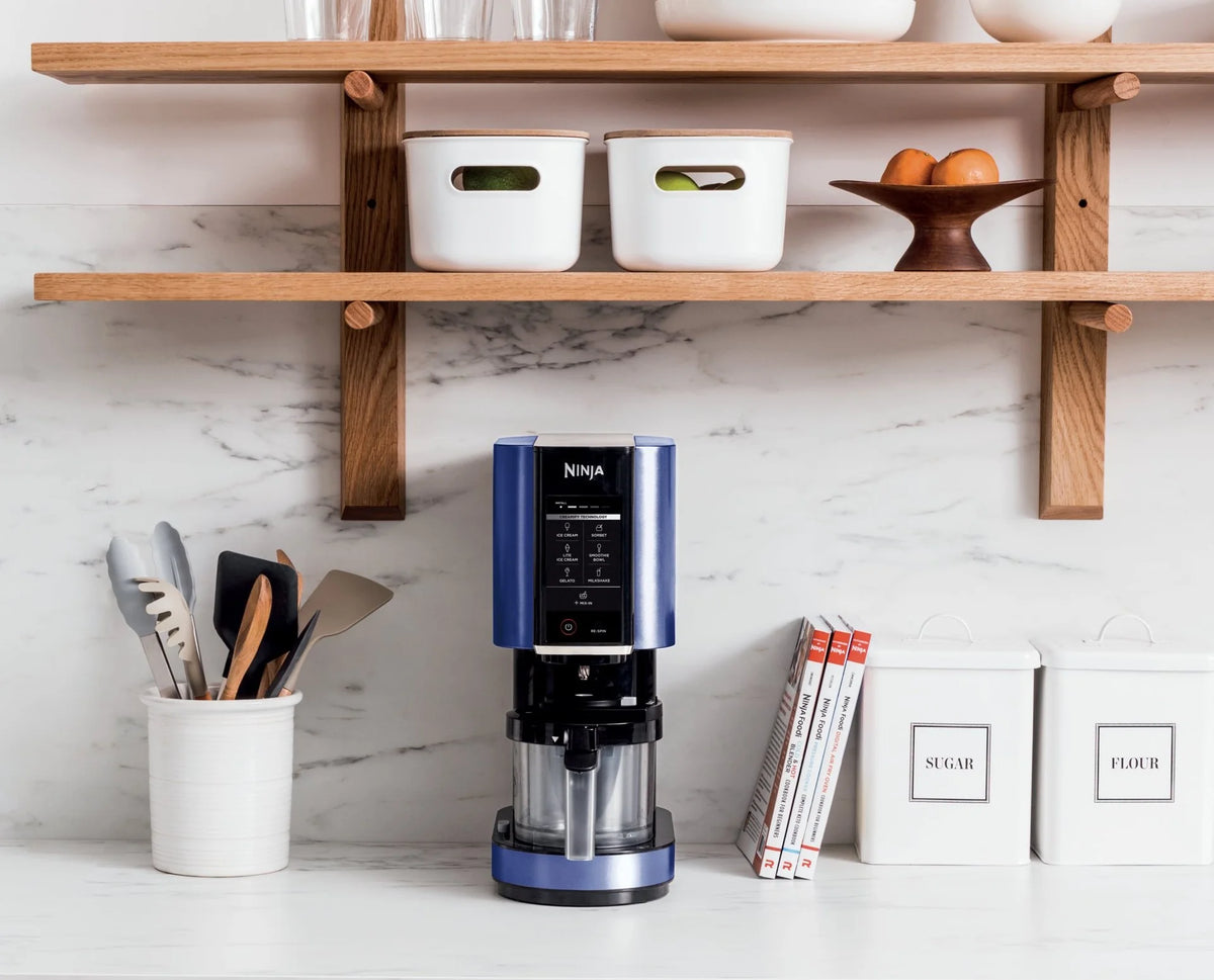 Restored Ninja NC301 CREAMi Ice Cream Maker, for Gelato, Mix-ins, Milkshakes, Sorbet, Smoothie Bowls & More - Navy Blue (Refurbished)