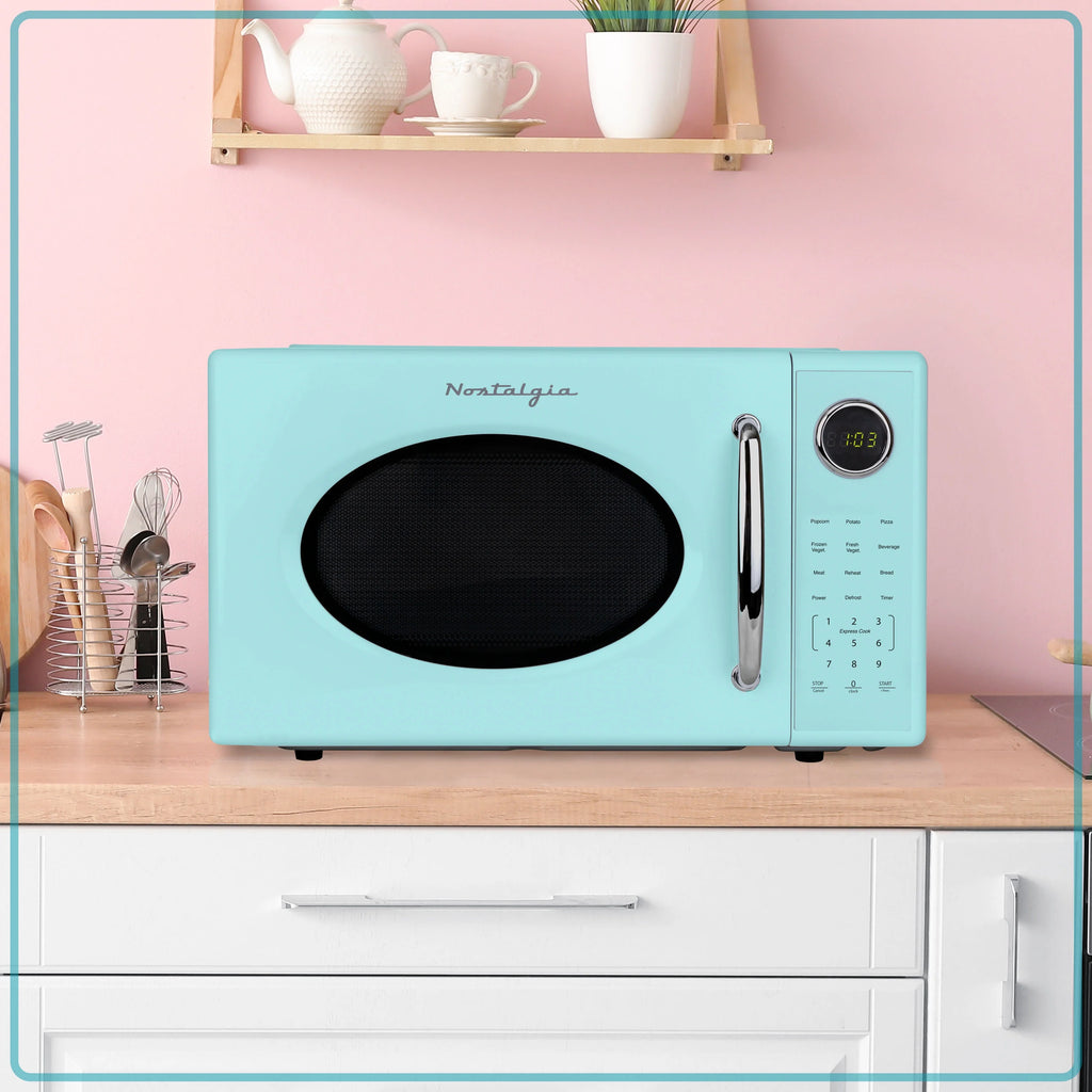 Nostalgia Retro Microwave Oven - 1.1 Cu Ft & 1000-Watt Countertop Size with Glass Turntable, Child Safety Lock, 8 Auto-Cook Programs & Digital Clock - Black