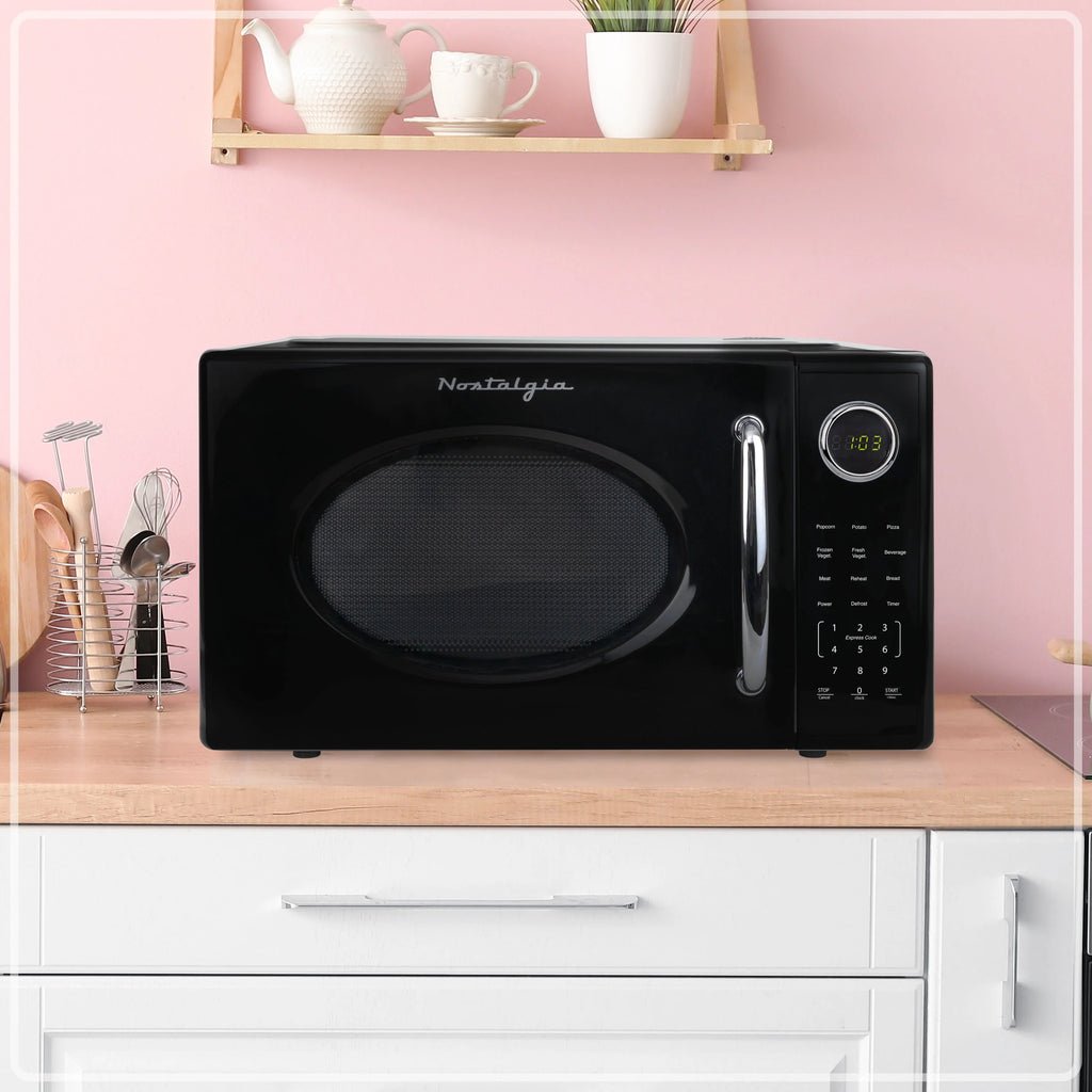 Nostalgia Retro Microwave Oven - 1.1 Cu Ft & 1000-Watt Countertop Size with Glass Turntable, Child Safety Lock, 8 Auto-Cook Programs & Digital Clock - Black