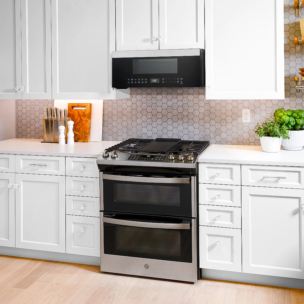 GE Profile 1.2 cu. ft. Low Profile Over-the-Range Microwave in Stainless Steel with Sensor Cooking, 1000W, 400 CFM Venting, LED Light
